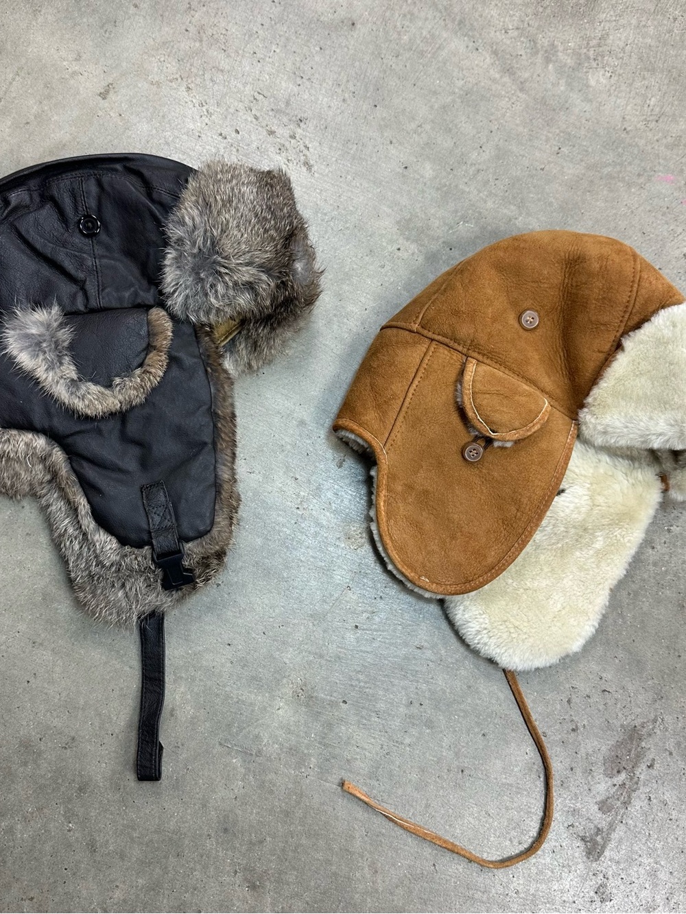 2 Men’s leather trapper hats